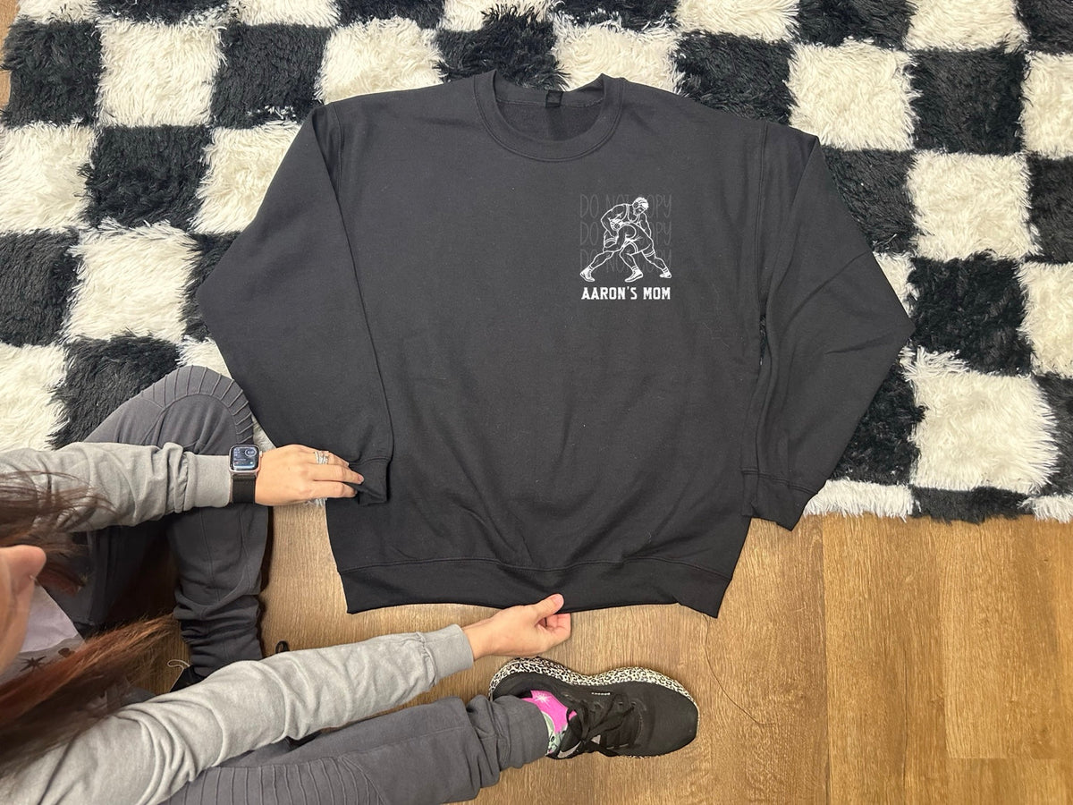 Personalized Aaron's Mom wrestling icon front on black sweatshirt