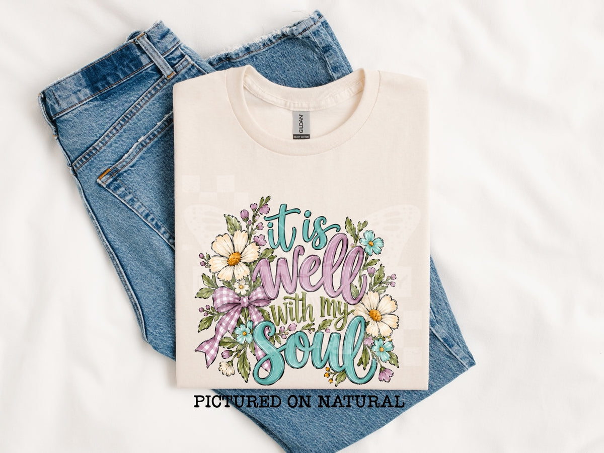 It Is Well With My Soul floral tee pictured on natural